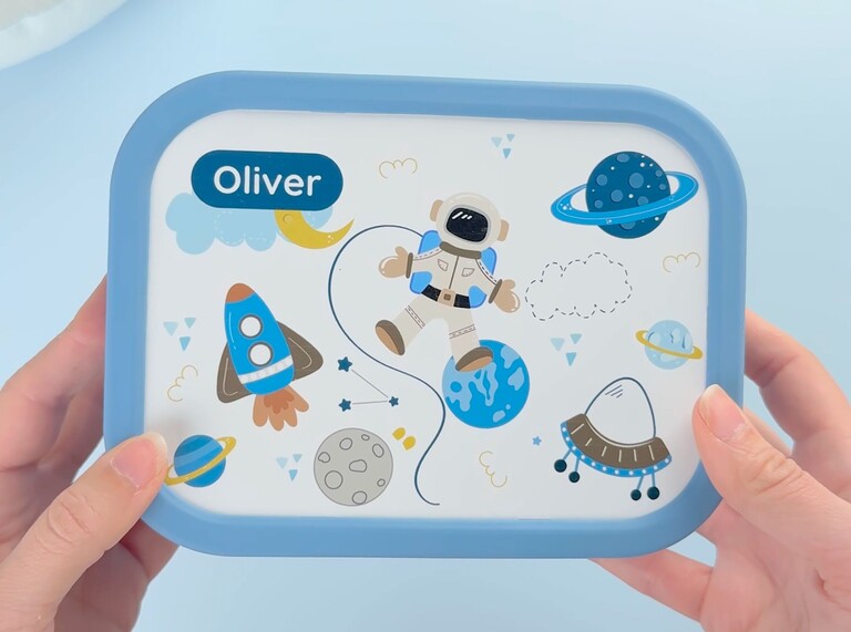 Boîte à goûter bleue avec design astronaute et prénom