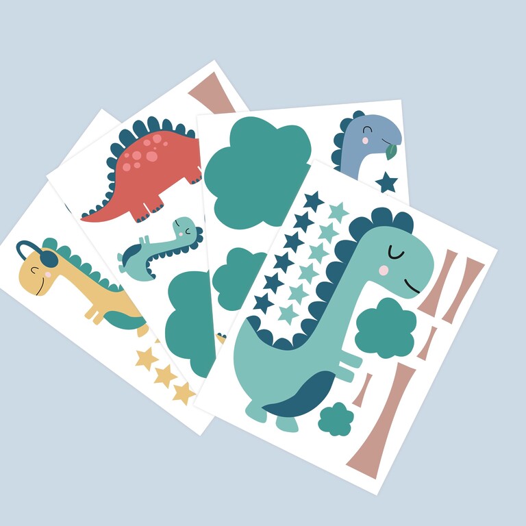 Planches de stickers muraux dinosaures disposées en éventail