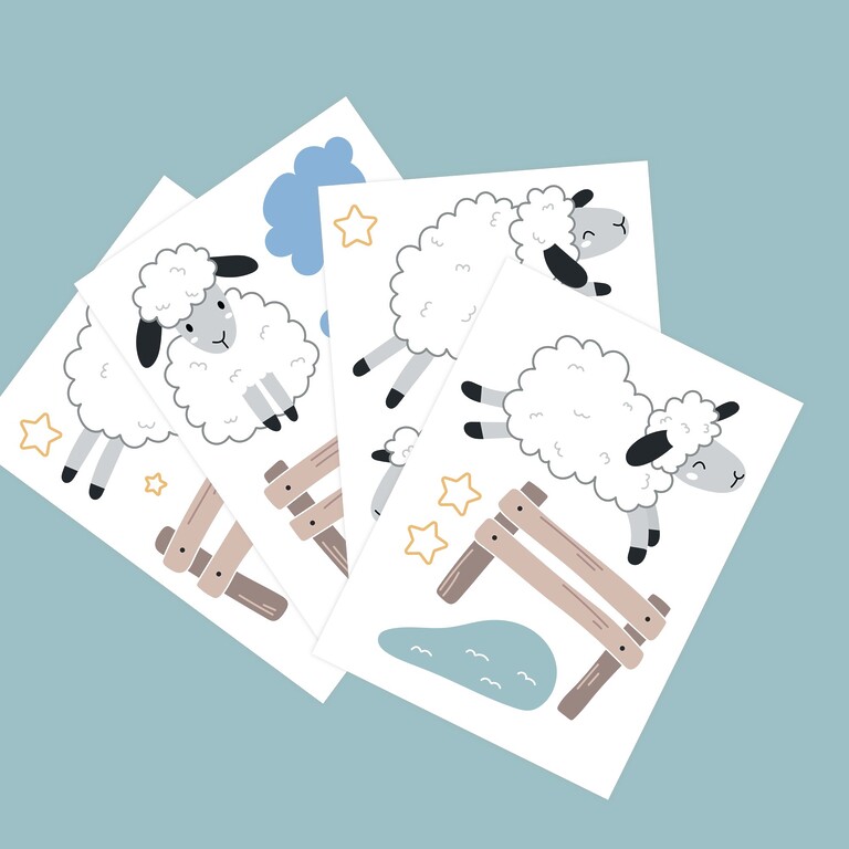 Vue en éventail des stickers muraux moutons phosphorescents