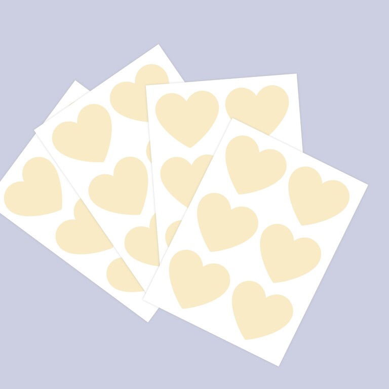 Vue en éventail des stickers muraux cœurs phosphorescents