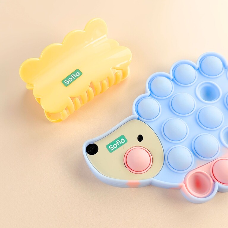 Mini-autocollants sur barrette et jouet